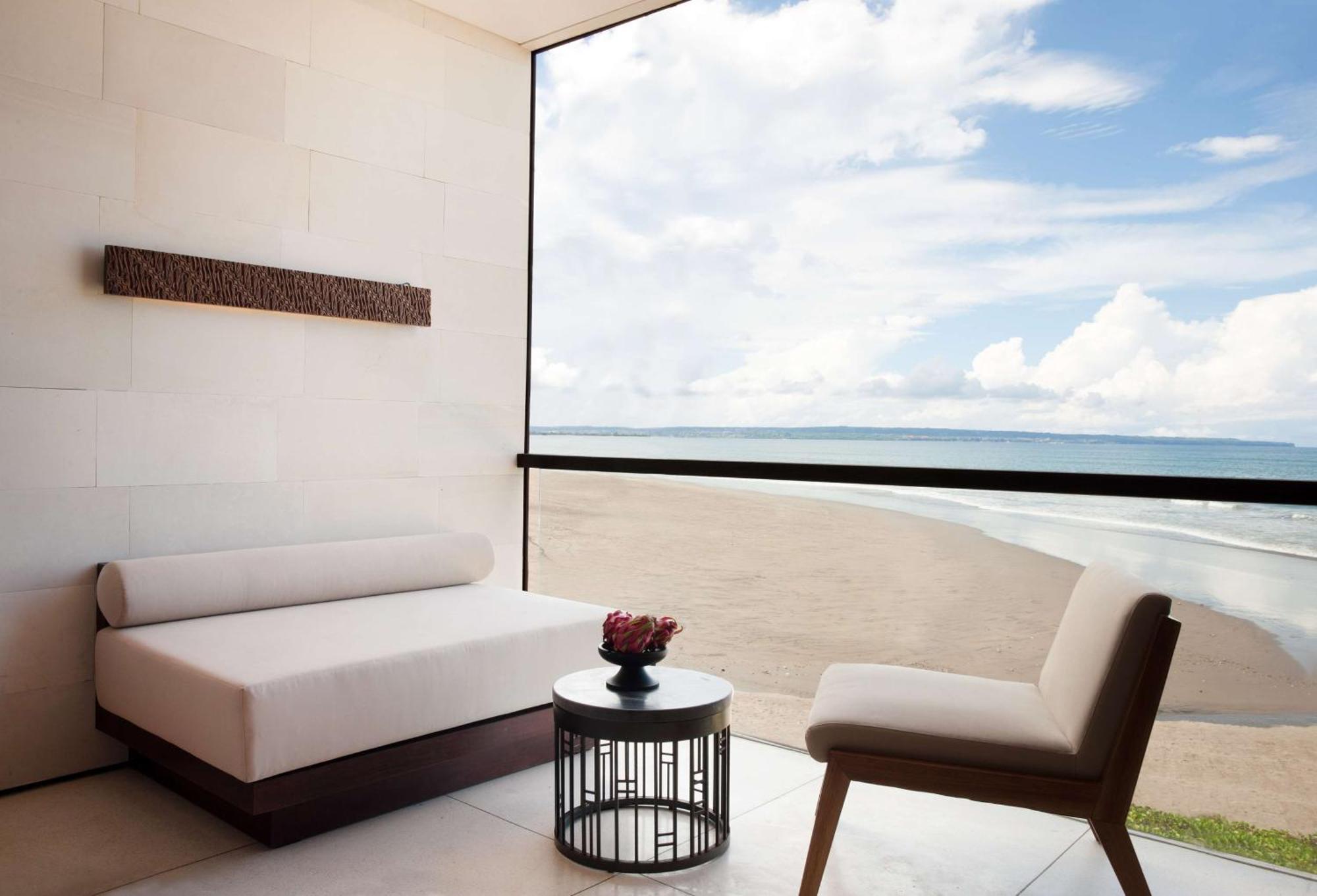 Отель Alila Seminyak Экстерьер фото A view of the beach from a room at the hotel